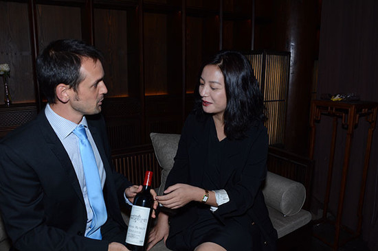 Zhao Wei and Chateau Monlot winemaker Jean de Cournuaud at private wine tasting in Beijing