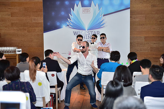 Image: Julien Boulard performing with Chinese wine educators at Wine Stars of China, credit Aroma Republic