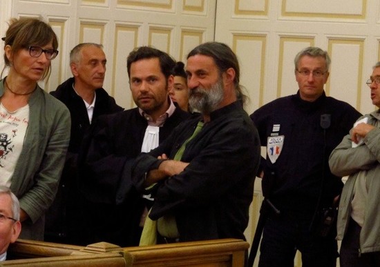 Olivier Cousin (centre) in court in Angers