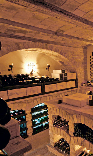 Above from left: Italian wine cabinet from La Cantina di Paul; a vaulted stone cellar by Friedrich Gruber