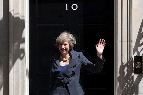 Housewarming: Theresa May outside number 10 Downing Street. Credit: Carl Court / Getty Images