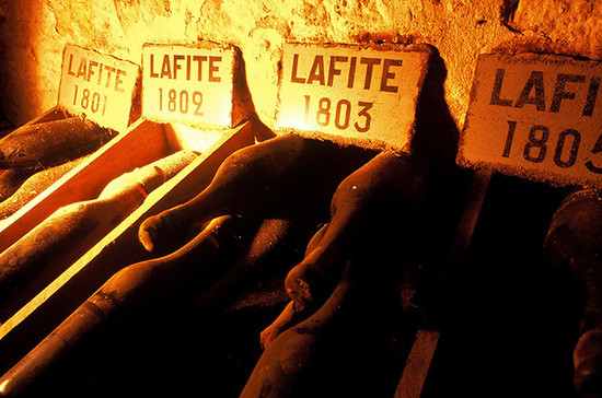 Bottles of Lafite from the early 19th Century in the château cellars in Bordeaux. 