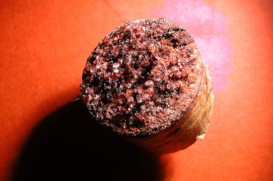 Tartrate crystals on a cork pulled from a bottle of red wine. Credit: John T Fowler / Alamy