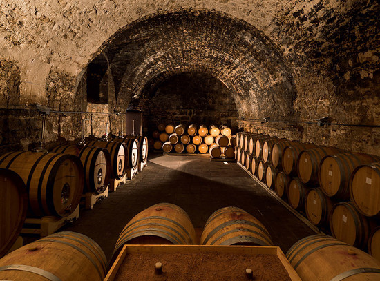 Right: barrel cellar at Scala Dei in Priorat, whose single-vineyard expressions are labelled using the Catalan spelling of Garnatxa