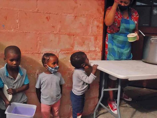 Children at one of the Journey’s End Foundation’s soup kitchens.